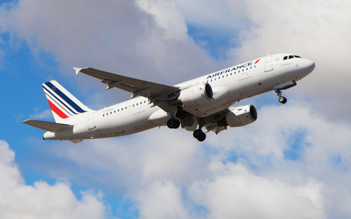 Air France Airbus A320-214 taking off from El Prat Airport in Barcelona, Spain.